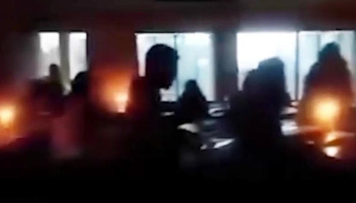 বিদ্যুৎ না থাকায় মোমবাতির আলোয় মাস্টার্স পরীক্ষা